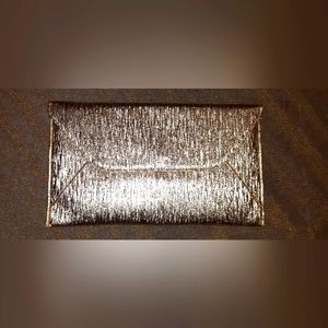 Medium/Large metallic gold thin clutch brand new never used